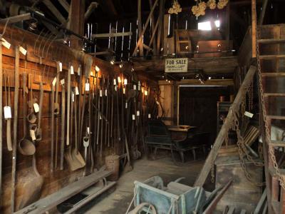 A view inside the refurbished Clapp Family Barn: Tools from Dorchester's agricultural past. Photo by Peggy Mullen